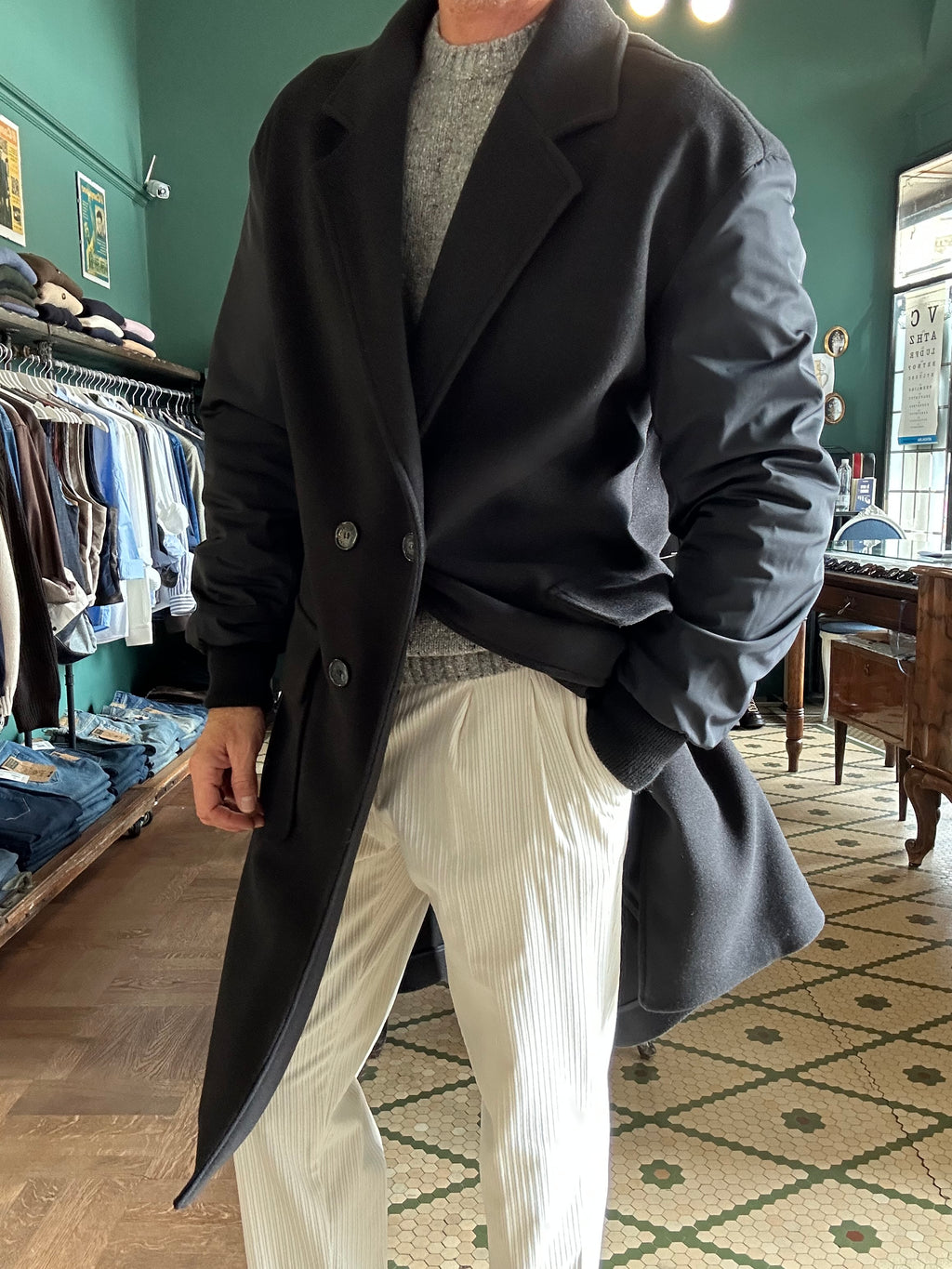 Cappotto doppiopetto con manica impermeabile