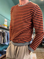 Maglione in lana a righe Nero e arancio