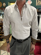 Striped shirt with contrasting trim and cuff