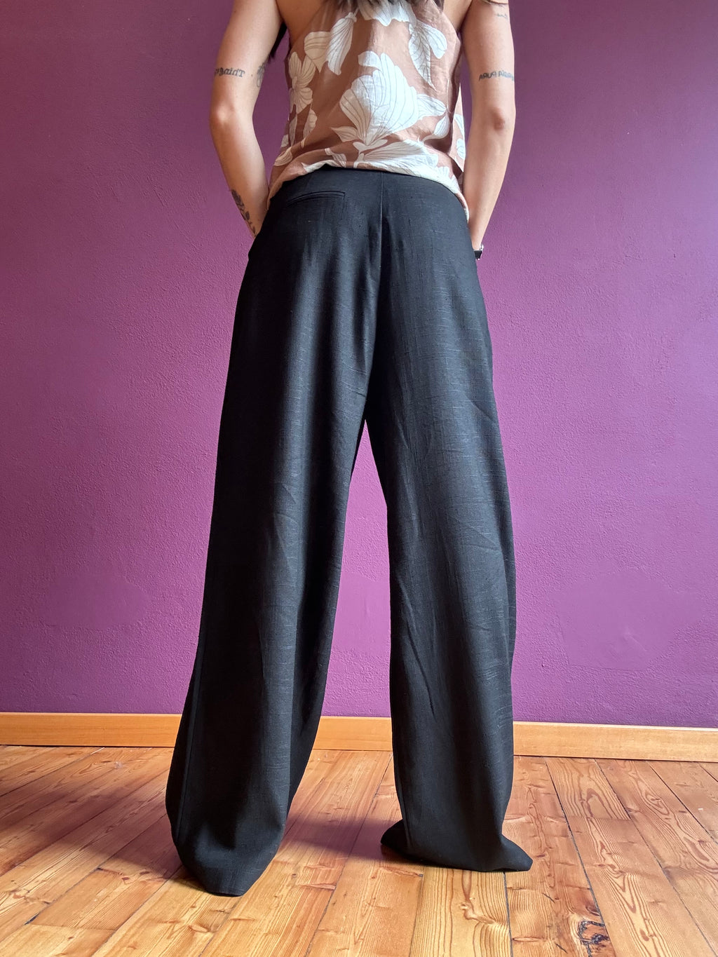 Black trousers with pleats
