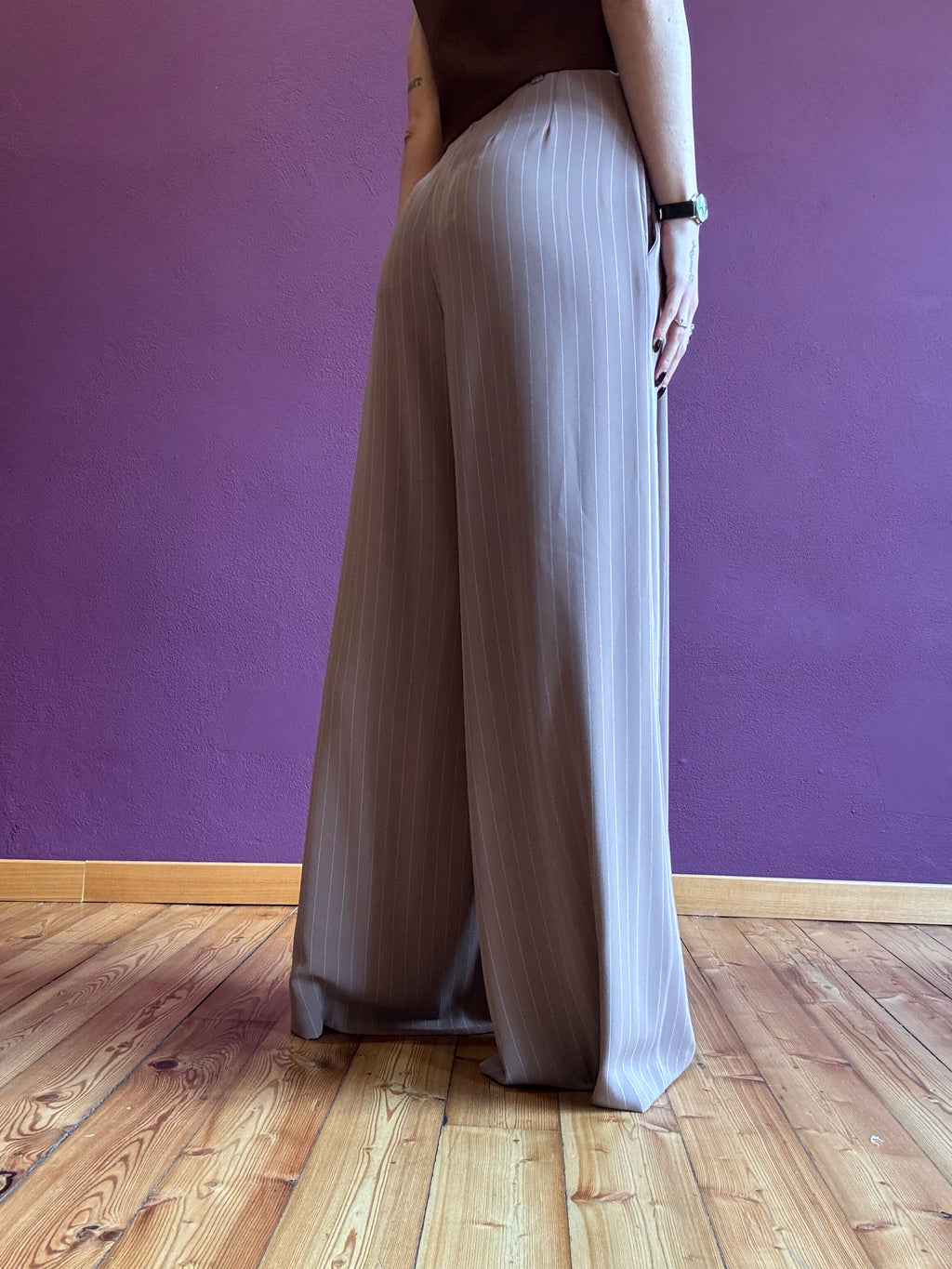 Pinstripe trousers with pleats and belt