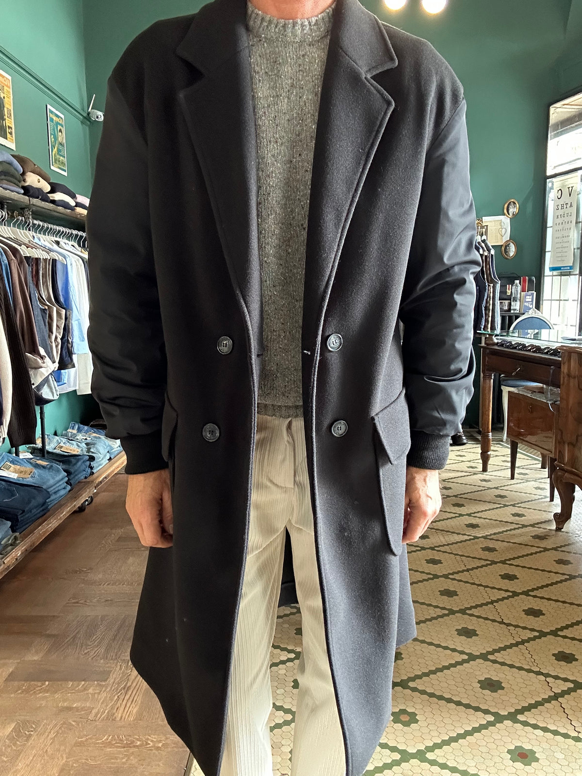 Cappotto doppiopetto con manica impermeabile