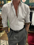 Striped shirt with contrasting trim and cuff