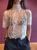 Maglietta in pizzo con fiocco